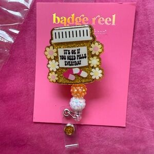 Glitter It’s OK Pill Badge Reel